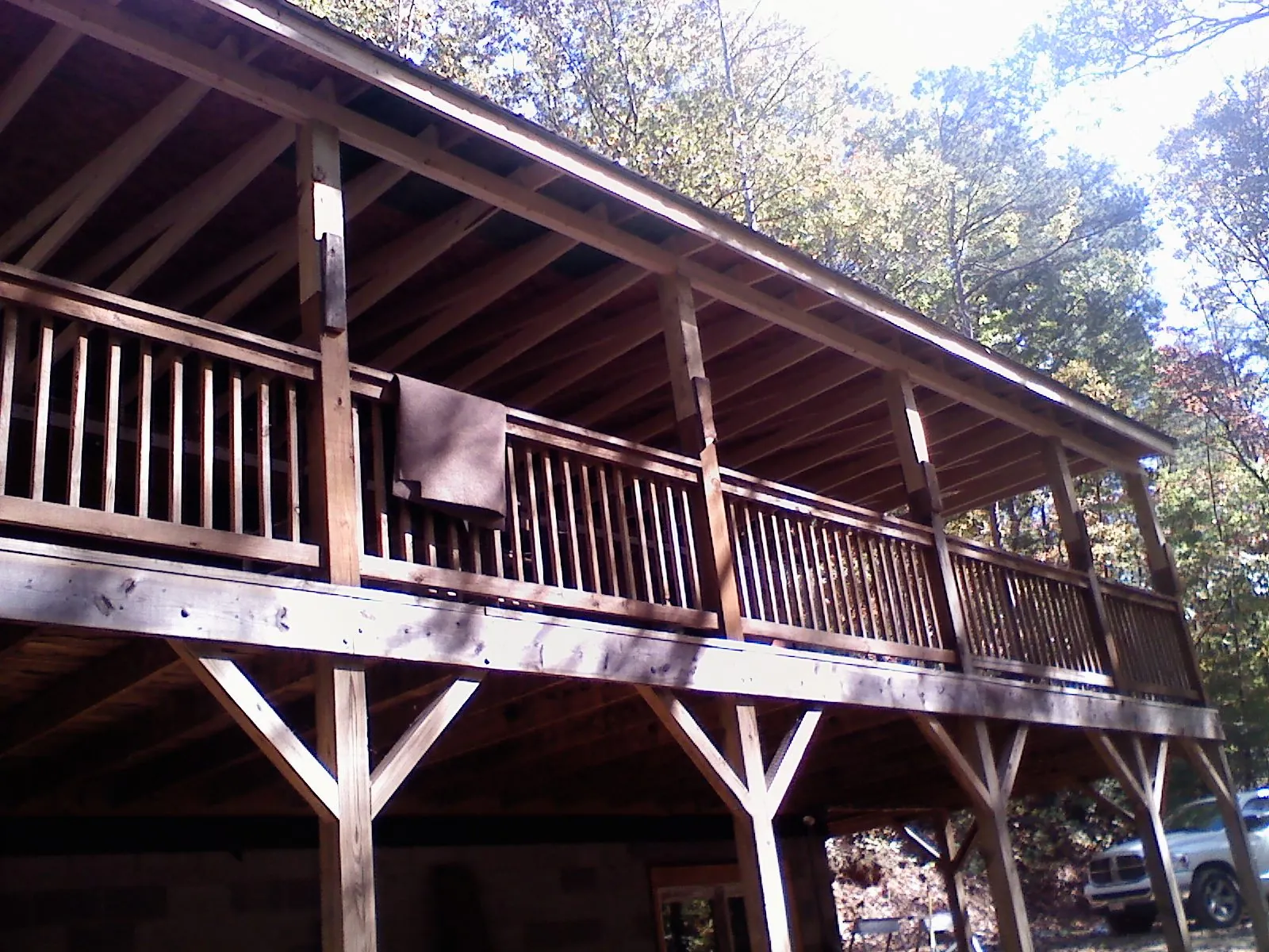 Timber framing under a new elevated porch and deck — Roof Leak Repair in Grandview by Roofing Brothers